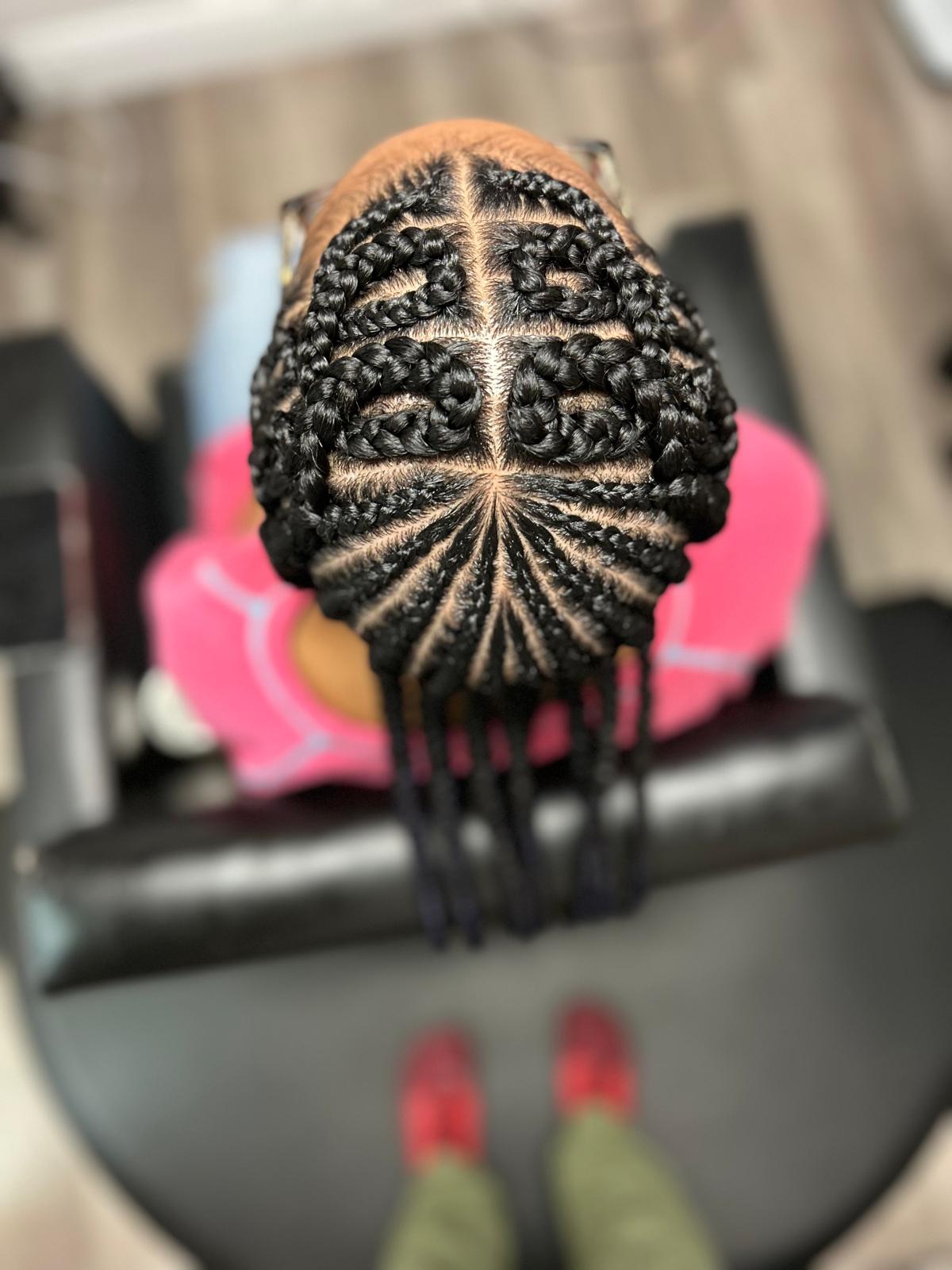 Incredibly detailed geometric cornrow braiding showcasing masterful technical artistry